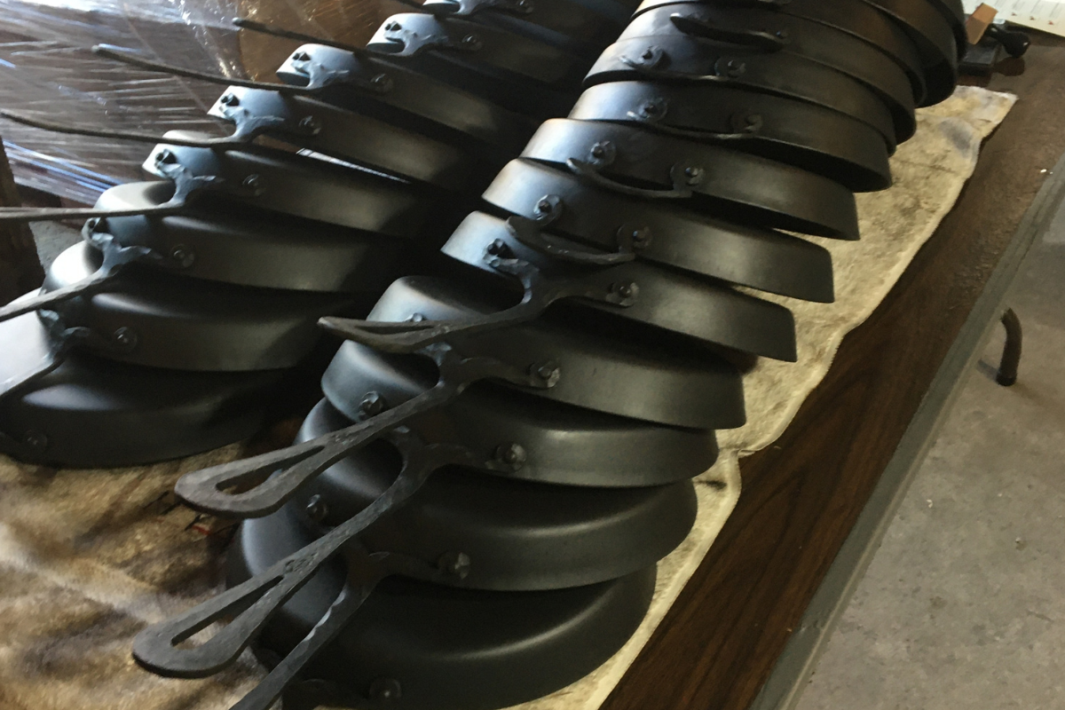 Hand forged skillets all lined up